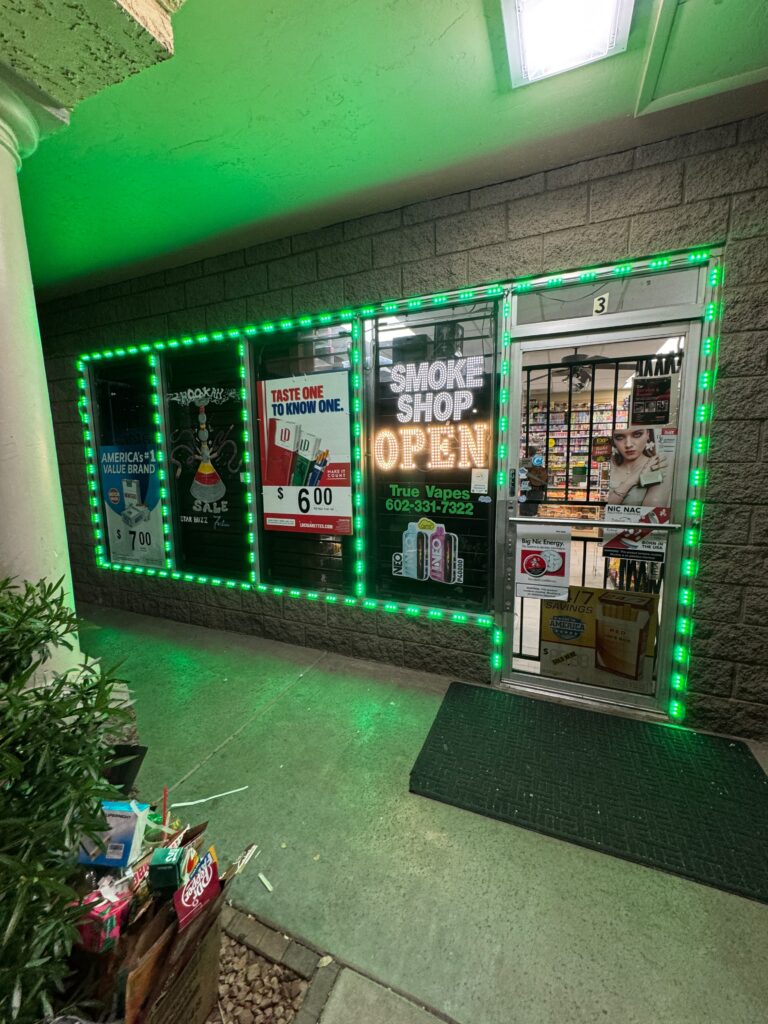 Green LED outline lighting around storefront windows